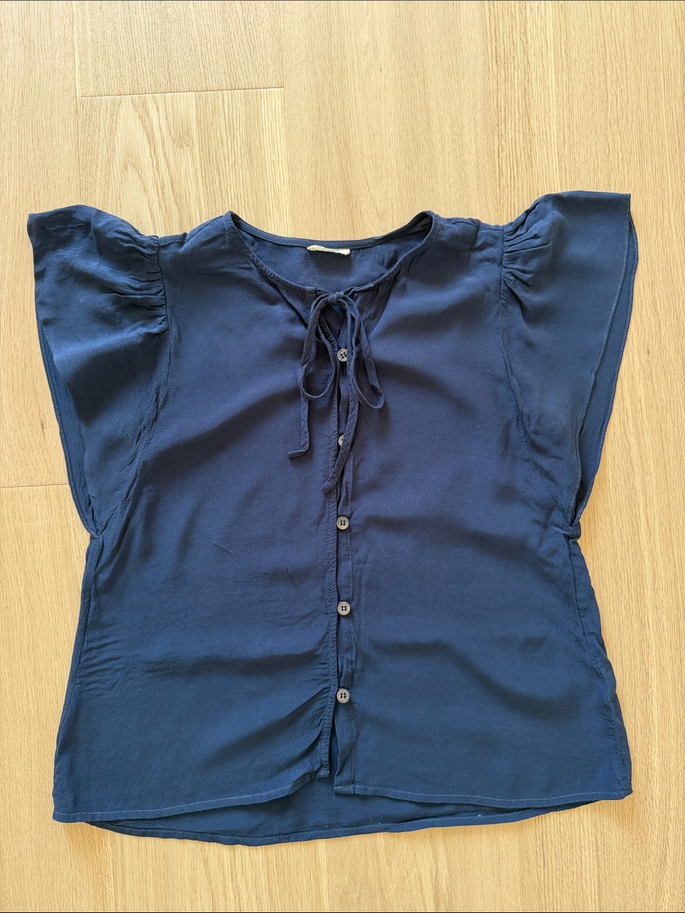 NAIF Navy Tie-Front Flutter Sleeve Blouse